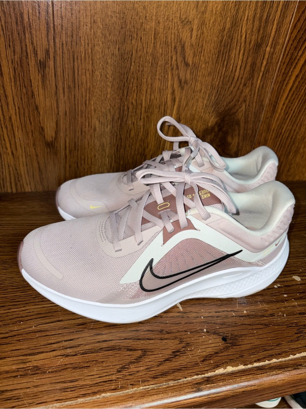 Nike Women's Running Shoes in Pale Pink and Black Swoosh